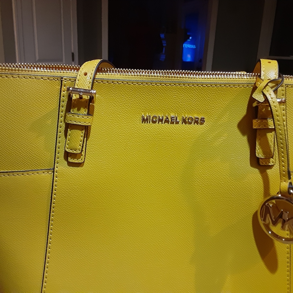 Medium size Mustard colored MK purse